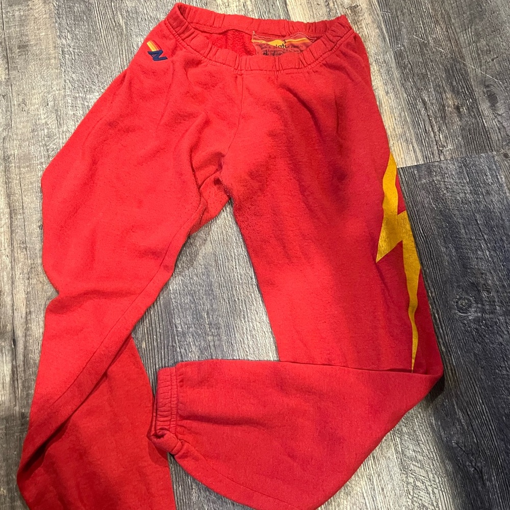 Aviator Nation Red Sweatpants with Yellow Lightning Bolt